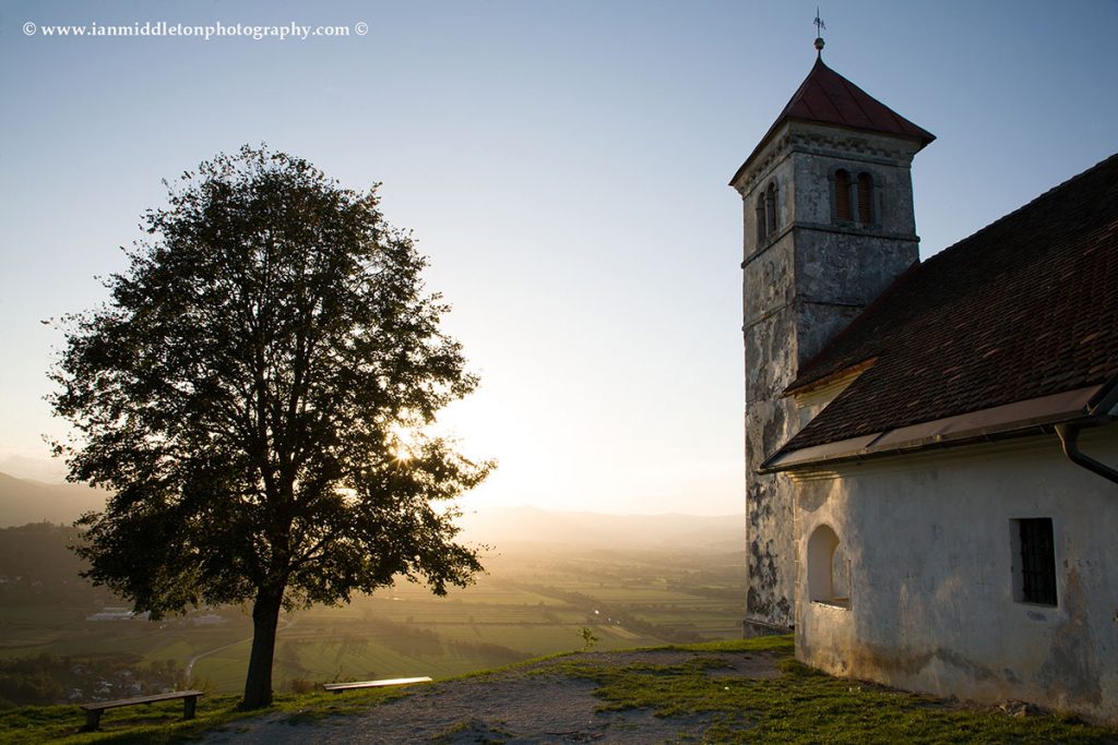 Sunset over the Ljubljana Moors, seen from the church of Sveta Ana in Slovenia.